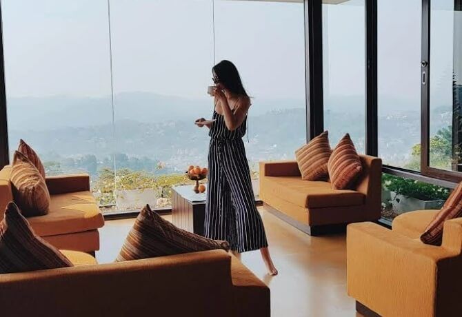 Relaxing with coffee in the stunning Penthouse at Theva Residency