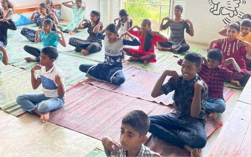 Supporting children through Seva project at Theva Residency