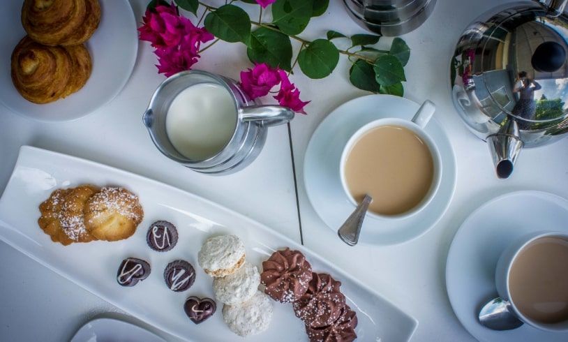Morning tea with delightful sweets at Theva Residency Kandy